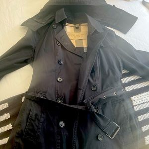 Black Burberry rain coat